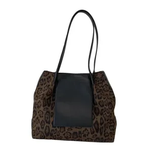 Large leopard print bucket tote bag with black splicing and slim shoulder straps