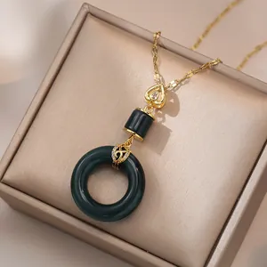 Retro style gold titanium steel necklace with green jade pendant and heart diamond clasp
