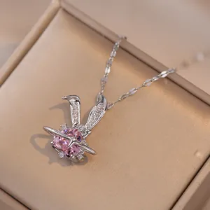 Cute bunny necklace with a pink heart-shaped crystal and sparkling silver chain