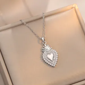 Micro-pave zircon heart pendant necklace with silver finish in a jewelry gift box