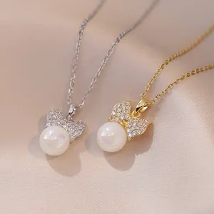 Collier Pendentif Noeud Papillon Acier Titane Zircone Pavé Avec Künstliche Perle Sirène Bijoux Élégants Pour Femmes