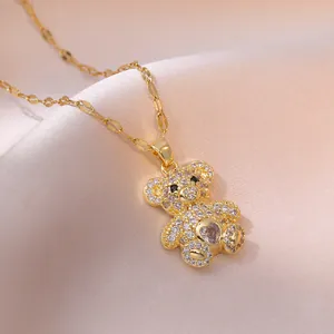 Golden necklace with heart-shaped bear pendant encrusted with sparkling cubic zirconia