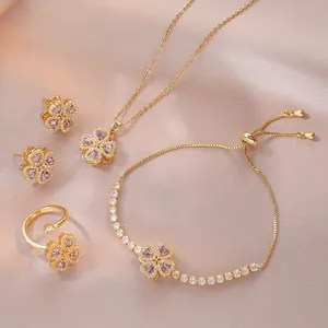 Parure bijoux trèfle doré avec zircons tournesol rotatifs et pierres violettes