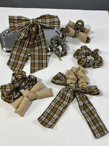 Brown tartan plaid bow hair clip and scrunchie set with pineapple pendant on white background