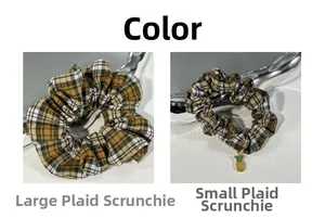 Detail view of yellow and black plaid scrunchies in large and small sizes with charms