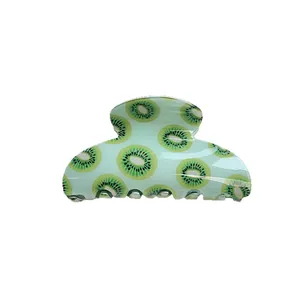 Fresh kiwi print hair claw clip in light green acrylic, minimalist fruit hair accessory