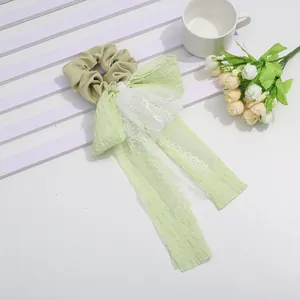 Elegant sweet lace ribbon bow hair tie in light green and khaki fabric for women