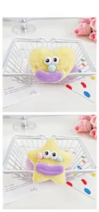 Détails de chouchous en peluche jaune avec yeux de dessin animé et lèvres violettes
