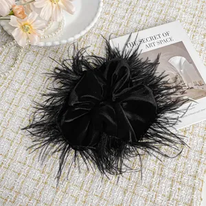 Elegant large black feather velvet scrunchie hair accessory for women in retro french style