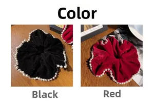 Detail of luxury velvet scrunchies in black and red with elegant pearl edge trim