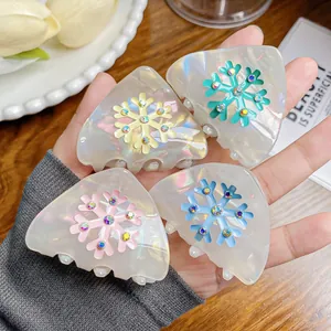 Set di quattro fermagli per capelli a orecchie di gatto perlati con strass a fiocco di neve