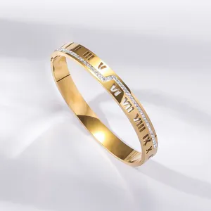 Elegant gold-finished Roman numeral bangle with sparkling zircon stones and open hinge