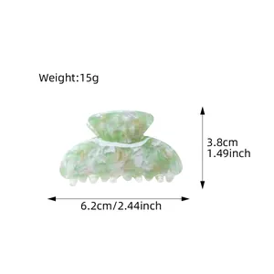 Pince à cheveux en acétate motif marbre vert, taille 6,2 cm et poids de 15 g