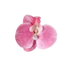 Pink phalaenopsis orchid hair clip with white pearl center for elegant hairstyling
