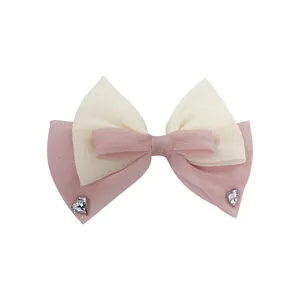 Barrette à nœud en résille rose et blanc ornée de strass étincelants en forme de cœur