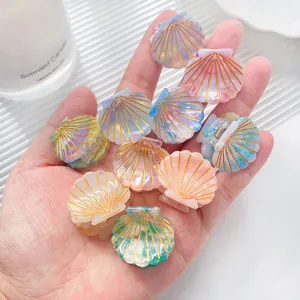 Mini acetate shell hair clips in 10 pastel colors with marble texture and gold accents