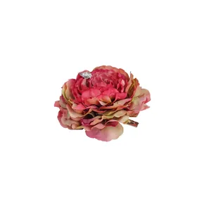 Peony flower hair claw with gradient petals and crystal accent on white background