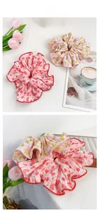 Detail of floral scrunchies set with heart patterns and textured chiffon fabric