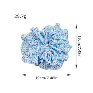 Floral print blue scrunchie with 19cm diameter and lightweight elastic fabric design