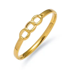 Bracciale rigido dorato traforato con fibbia a triplo anello lucido stile moderno