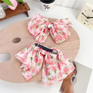Set fermagli per capelli con fiocco floreale rosa in chiffon su base di legno