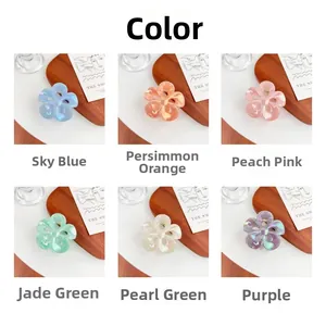 Detail showing various iridescent flower claw clips in six vibrant pastel colors