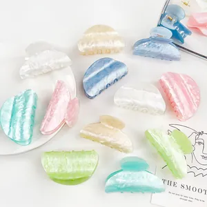 Set de pinzas para el cabello de acrílico con textura mármol en colores macaron