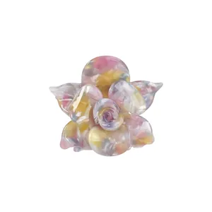 Pince à cheveux fleur en acétate avec motif marbré coloré aux tons macaron doux