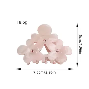 Pince à cheveux élégante avec fleurs rose pâle, strass et finition en acétate pour femme