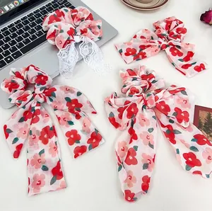Blumen-Haargummis Set aus orange-rotem Chiffon mit zarter Spitze und Schleifenband