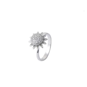 Elegant rotating sunflower ring in silver finish with pavé cubic zirconia petals