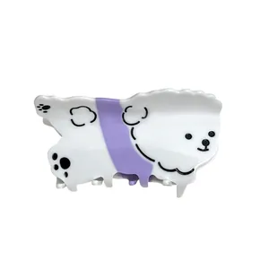 Cute acetate puppy hair claw clip for women featuring a minimalist white dog design