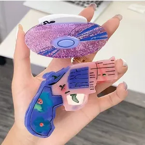 Unique acetate shark hair clips in glitter purple and floral handgun shape for women