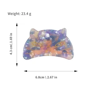 Colorful acetate cat hair claw clip with gold details and product dimensions shown