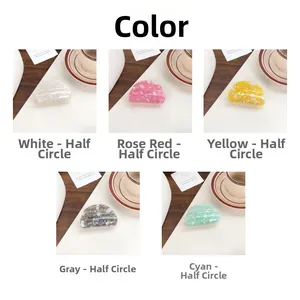 Detail view of semi-circular PVC hair claws in five marble patterns and vibrant colors