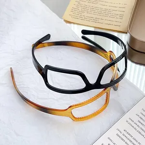 Toothed glasses-style headband for volume in black and tortoiseshell finish