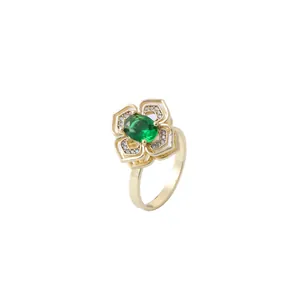 Elegant gold flower ring with green oval center stone and white zircon petal pavé