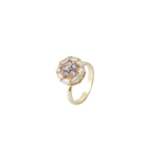 Elegant gold-tone ring with purple flower petals and clear cubic zirconia halo