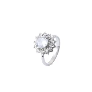 Elegant floral halo ring with round clear center stone and micro-pave petals in silver finish
