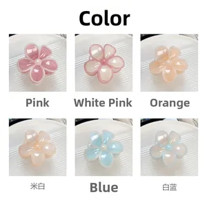 Detailed grid view of candy-colored flower hair claws in six soft pastel resin finishes