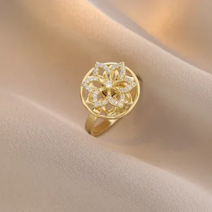 Rotating gold flower ring with sparkling white zircon micro-paving for women