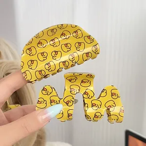 Lot de deux pinces à cheveux jaunes motif canard en acrylique pour coiffure