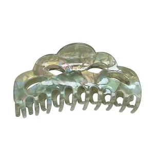 Elegant large green marble acetate hair claw clip with cloud wave design for women