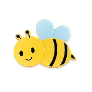 Cute cartoon honey bee acetate hair clip with yellow body and blue wings on white background