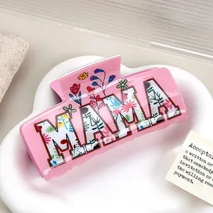 Pink acrylic MAMA hair claw clip featuring delicate floral patterns and a square design