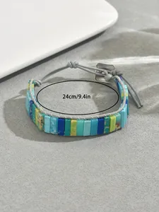 Detailansicht Naturstein Armband mit gewebter Schnur und 24cm Größenmarkierung