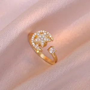 Bague rotative étoile lune dorée avec zircons pavés et anneau ouvert réglable