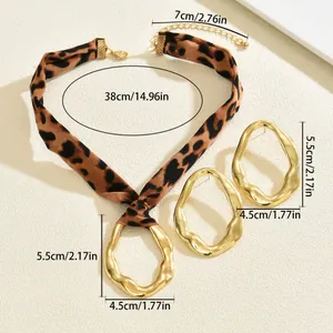 Fashion jewelry set with leopard print fabric necklace and gold wrinkled metal pendants