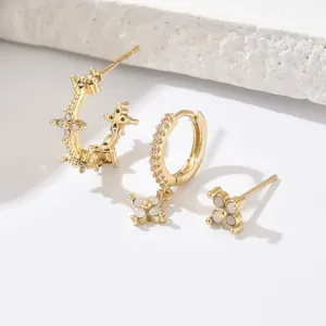 Three-piece set of gold-plated floral earrings featuring white shell inlay and zircon accents