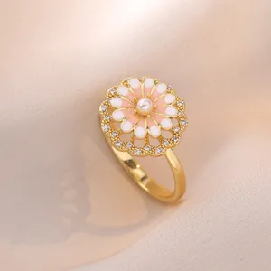 Pink and white daisy flower ring with micro-pave zircons and small pearl accent